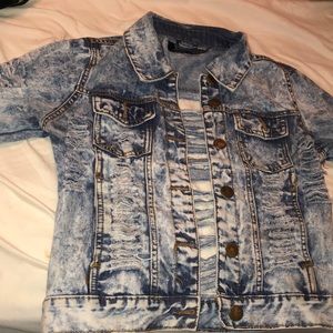 Vintage ripped blue jean jacket